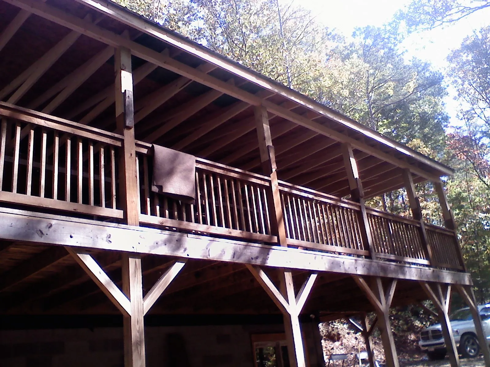 Timber framing under a new elevated porch and deck — Roof Leak Repair in Bailey Island by Roofing Brothers